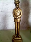 IMAGEM EM GESSO DE EXU 20 CM EM ACABAMENTO DE OURO EN